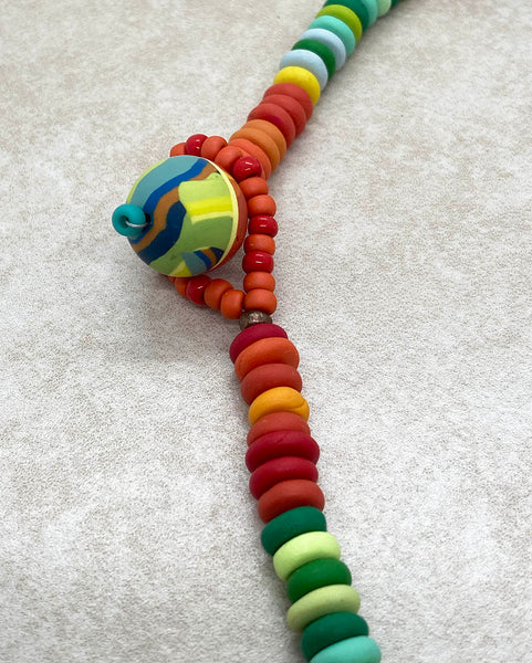 bead and loop closure shown attached